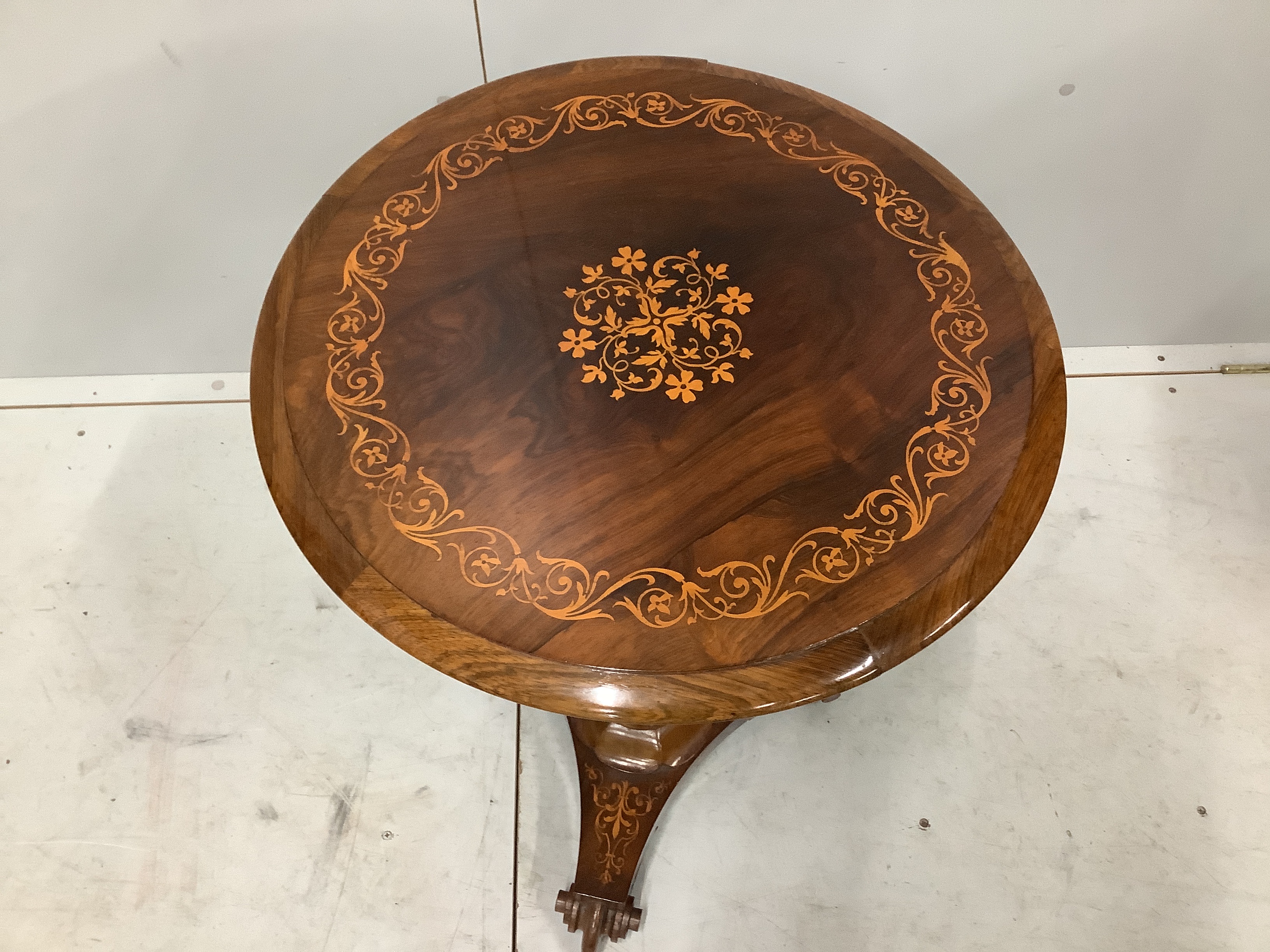 A 19th century French inlaid rosewood circular topped work table, diameter 50cm, height 74cm